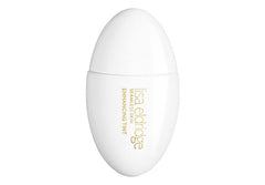 Lisa Eldridge Seamless Skin Tint T4 bottle close-up for neutral golden undertone and natural-looking coverage.