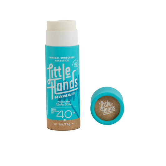 Little Hands Hawaii SPF 40+ reef-safe sunscreen stick on the face for outdoor protection