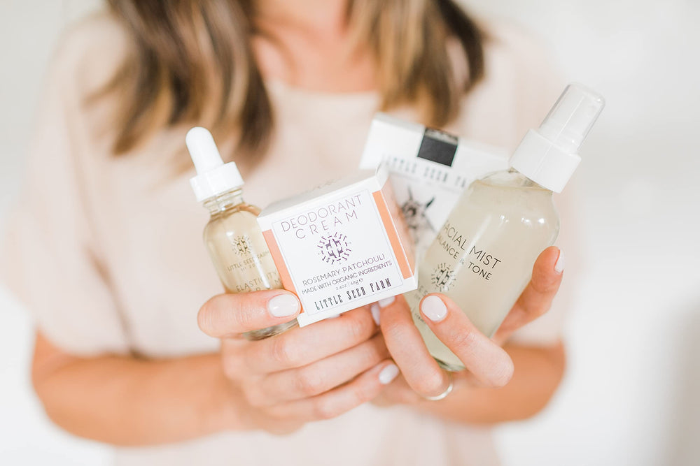 Packaging and branding of Little Seed Farm deodorant on display