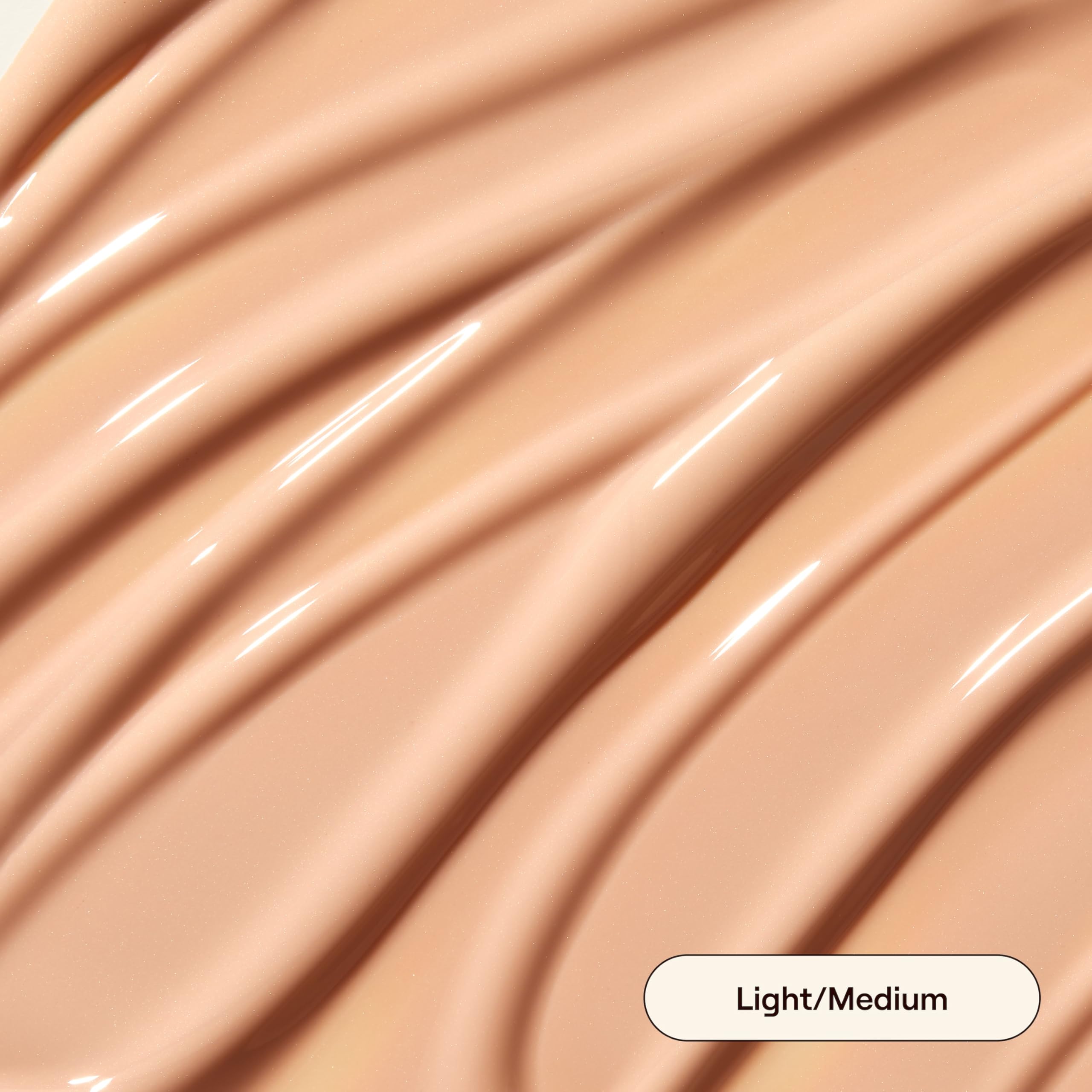 Live Tinted Hueguard Glotion nozzle pour close-up for even application