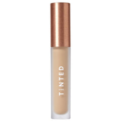 Live Tinted Hueskin Serum Concealer packaging shown for easy on-the-go touch-ups.