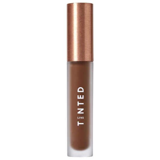 Live Tinted Hueskin Serum Concealer packshot shows buildable coverage.