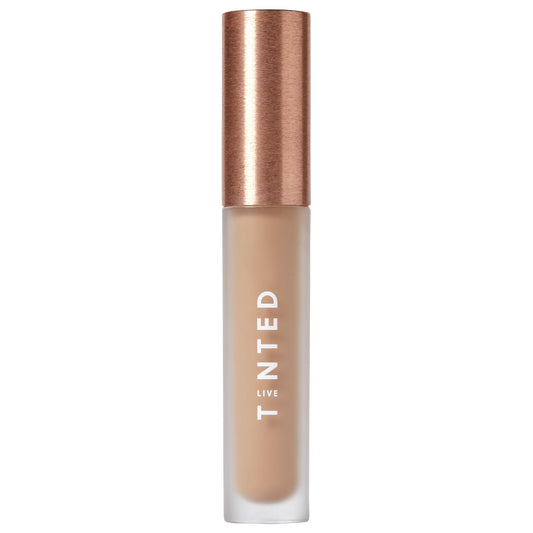 Live Tinted Hueskin Serum Concealer tube in shade 12 for long-lasting coverage.