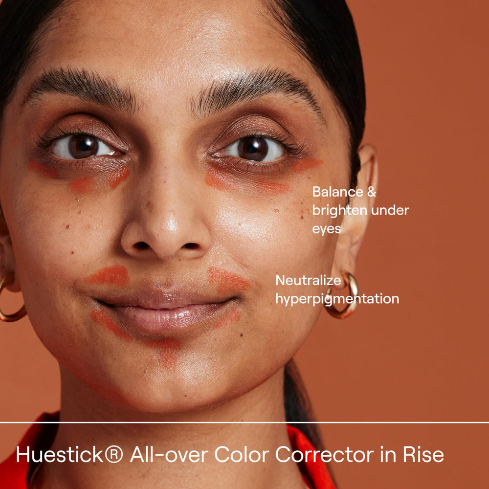 Live Tinted Huestick on cheeks delivers natural glow and easy touch-ups.