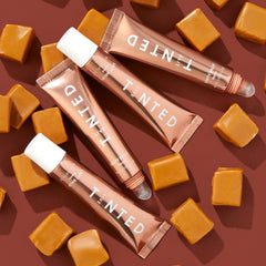 Live Tinted Unity Balm swatch in universal warm tint enhances natural lip color.