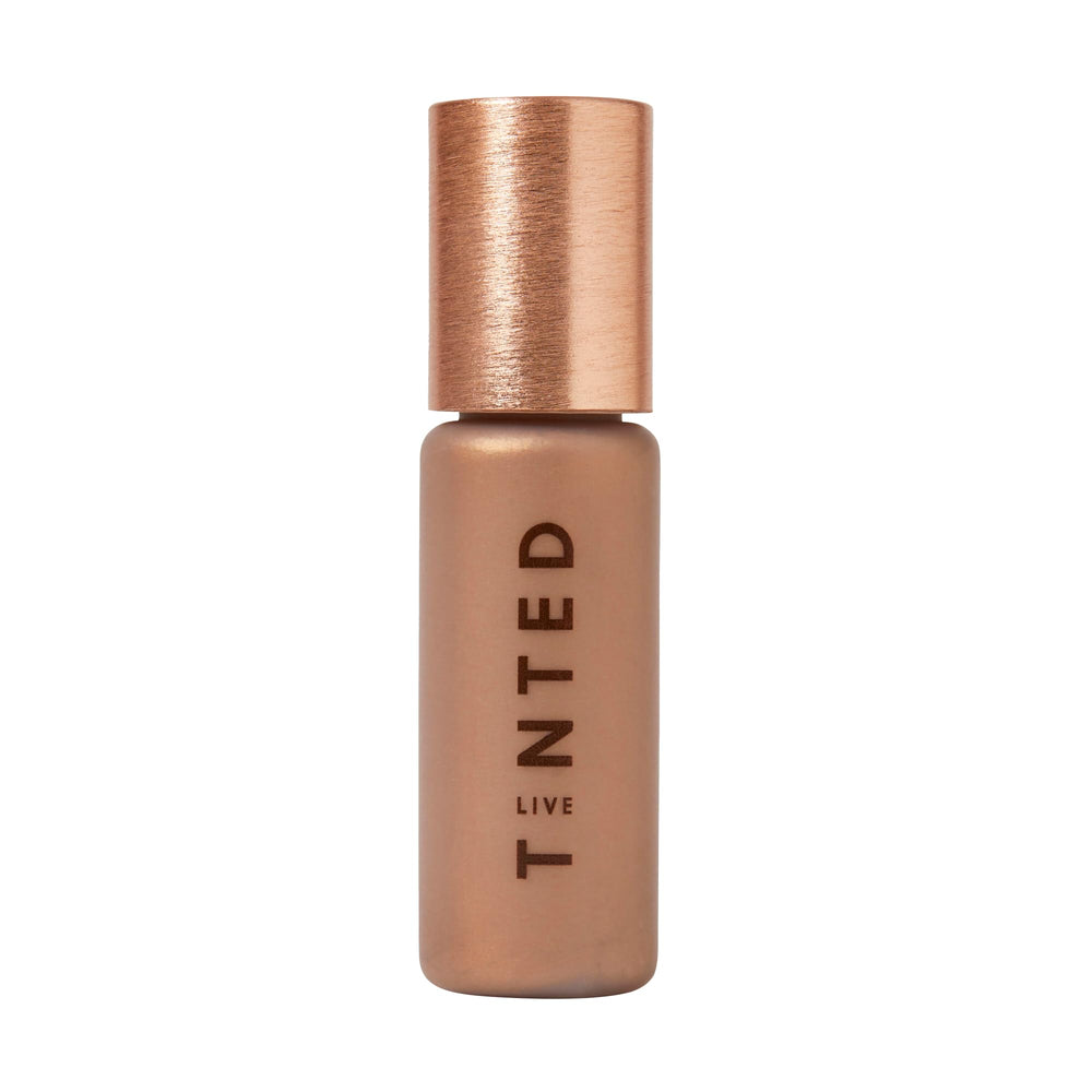 Live Tinted Hueglow drops bottle pour highlights a lightweight glow