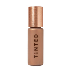Live Tinted Hueglow drops bottle pour highlights a lightweight glow