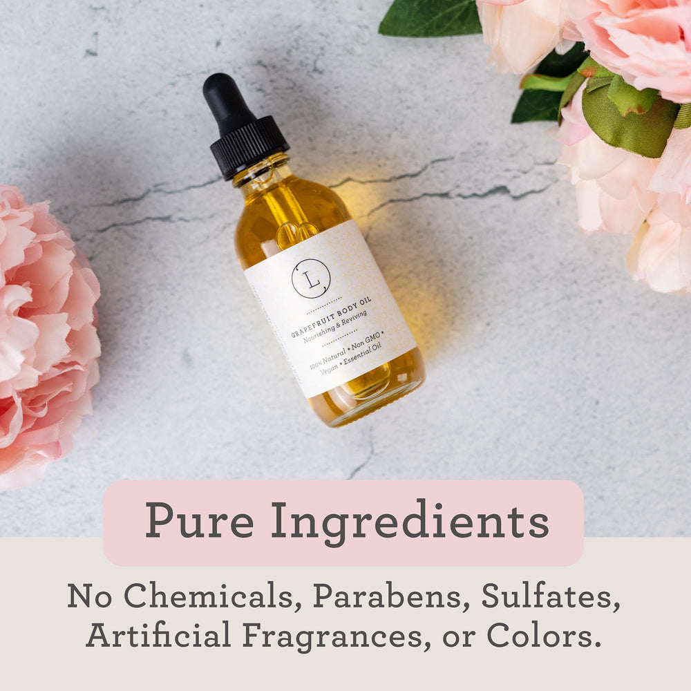 Gift-ready grapefruit body oil in glass bottle