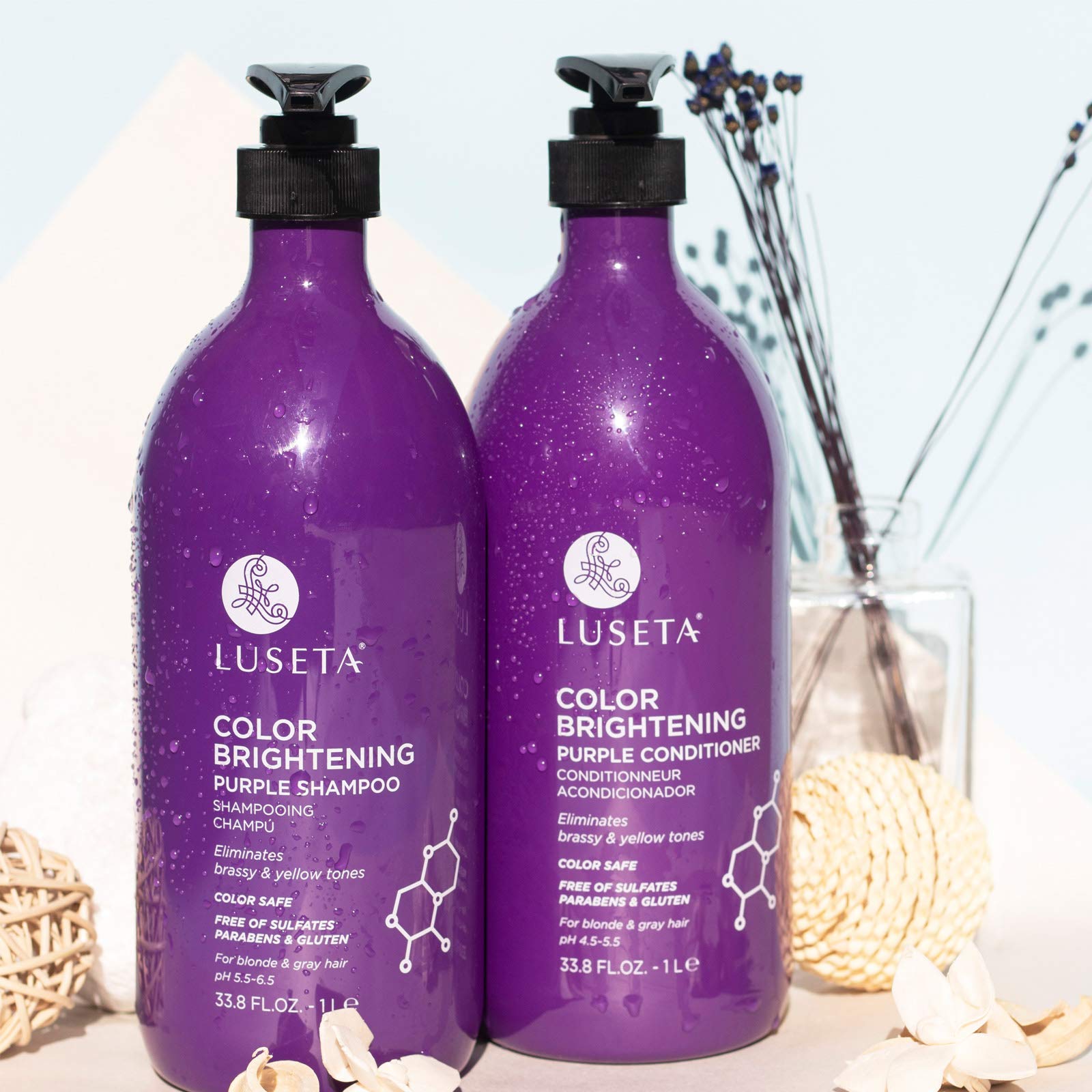L LUSETA shampoo close-up with foamy lather ready to cleanse hair