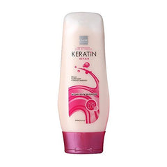 L'MAR Keratin Repair bottle demonstrates a nourishing hair treatment that strengthens and hydrates.