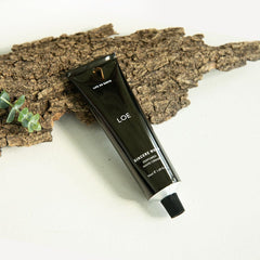 SINCERE WOOD fragrance swatch on LOE hand cream preview.