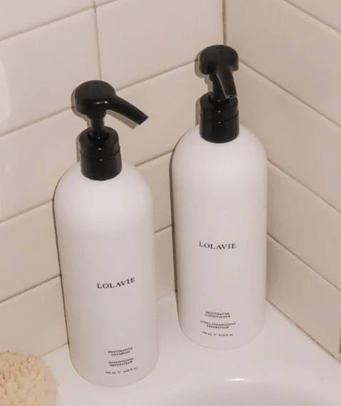 Lolavie Mega Wash Day Essentials bottle—restorative shampoo and conditioner for stronger, hydrated hair.