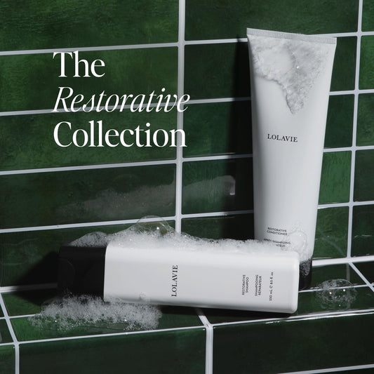 LolaVie Restorative Conditioner bottle highlights bond-building care for smoother, softer strands.