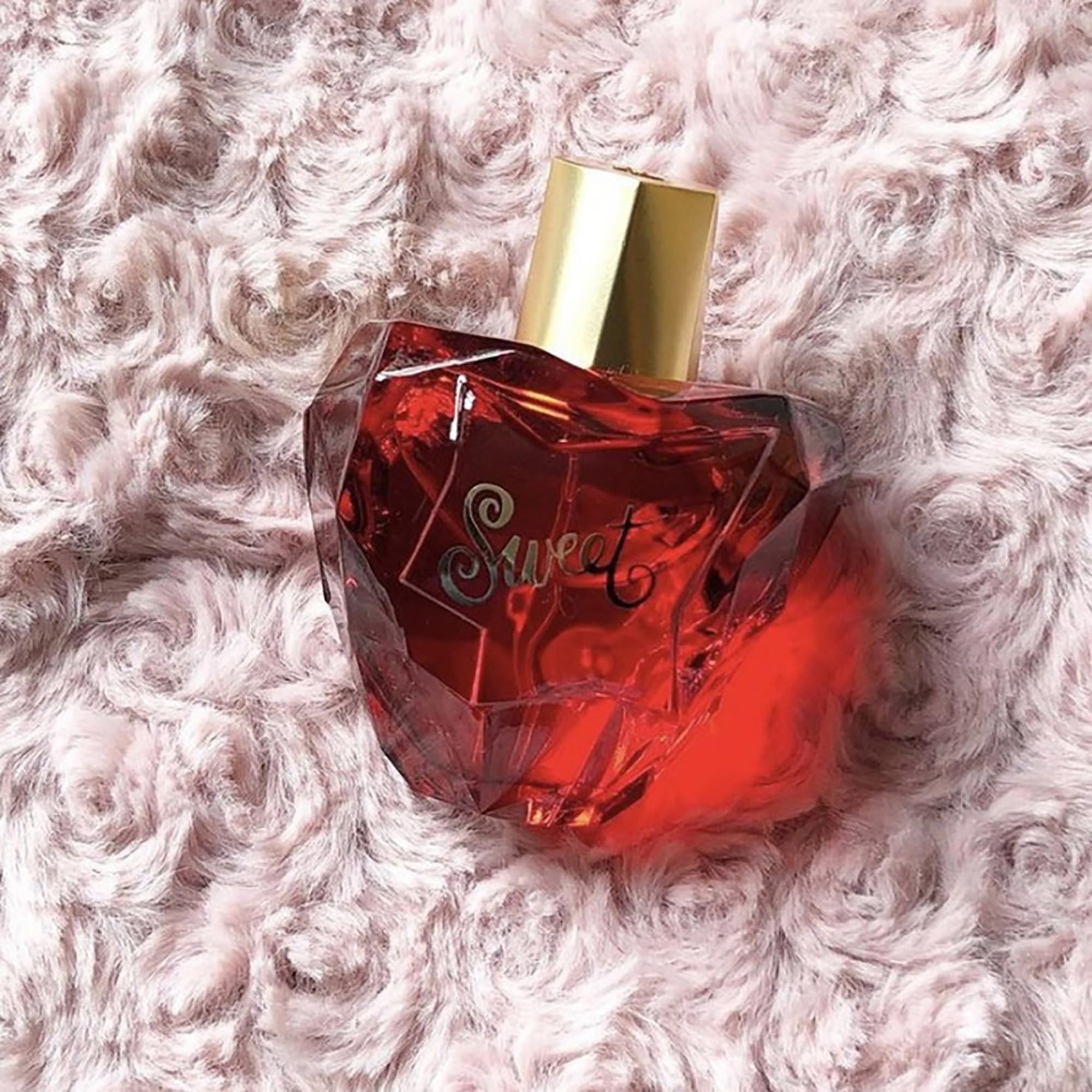 Lolita Lempicka Sweet box packaging showcasing gem like allure for gifting