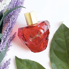 Lolita Lempicka Sweet bottle scent swirl inviting a feminine aura for daily wear