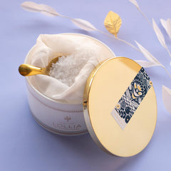 LOLLIA Dream Bath Salt in a tub with steam and serene ambiance