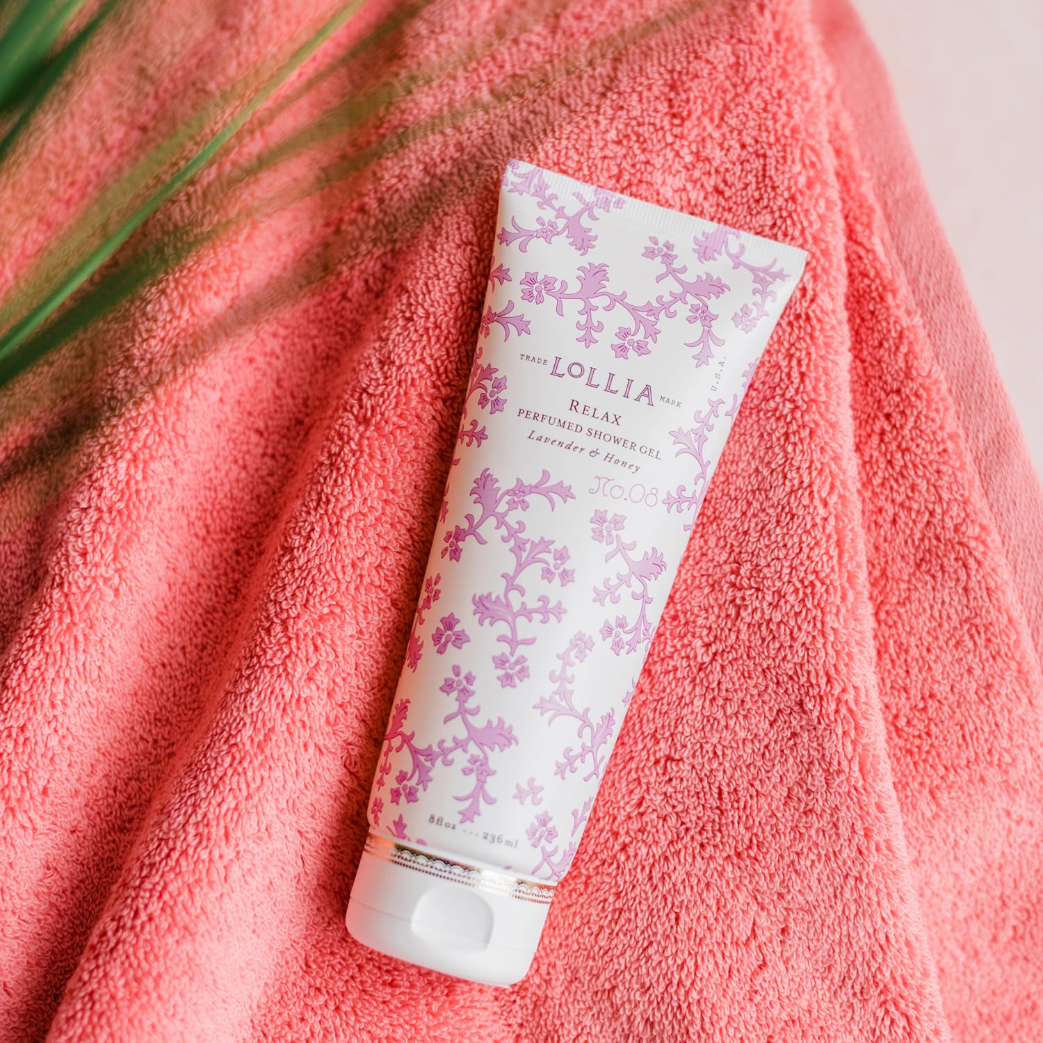 Bathroom setup featuring LOLLIA Relax Shower Gel for everyday luxury.