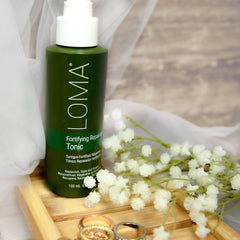 Loma Fortifying Reparative Tonic after-use shine suggests silky finish.