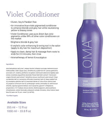 Close-up of Loma Violet Conditioner texture showing rich hydration for all hair types.