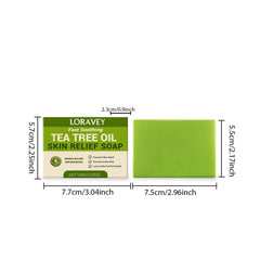 Loravey Tea Tree Soap bar on shelf with natural herbs and ingredients