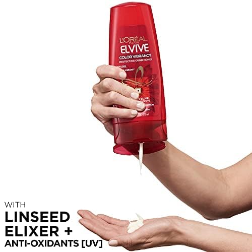 L'Oreal Paris Color Vibrancy Nourishing Shampoo application scene for easy distribution through wet hair.