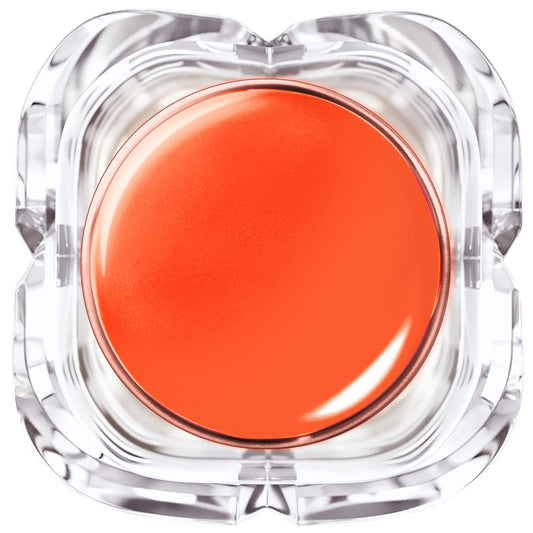 L'Oreal Paris Colour Riche Plump and Shine Nectarine Plump lipstick tube in hand showing color