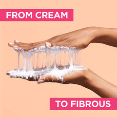 Bottle of Dream Lengths Savior Fiber Mask with warm lighting for spa-like feel.