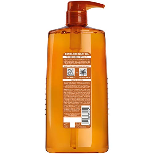 Elvive Extraordinary Oil Shampoo bottle with cap visible suggests easy, controlled dispensing.