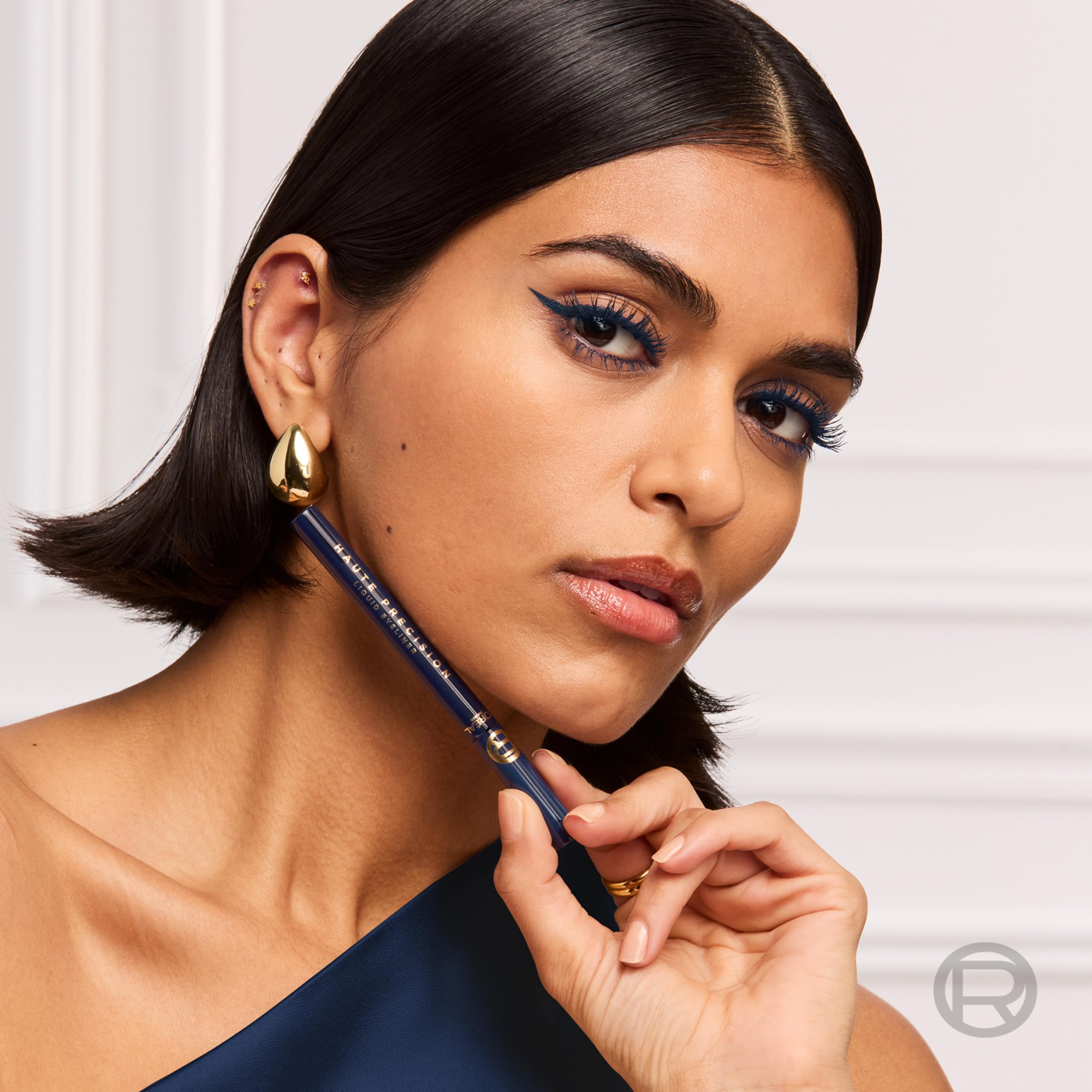 L'Oreal Paris Haute Precision eyeliner applied along upper lash line for lasting color.