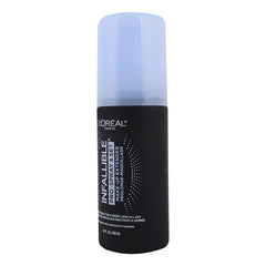 L'Oreal Paris Infallible Pro-Spray mist application shows a light finish.