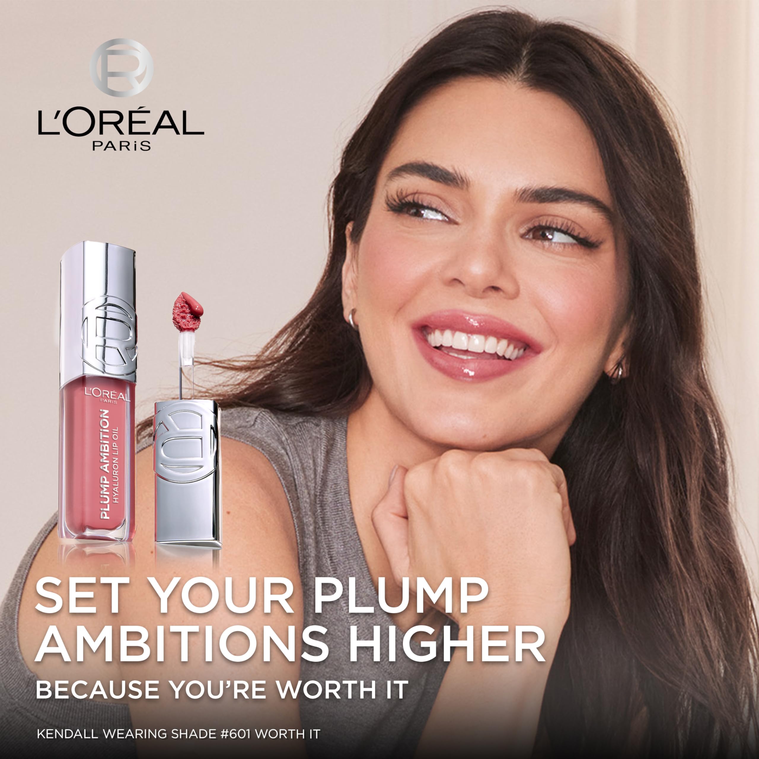 L'Oreal Paris Plump Ambition lip oil glass shine finish on lips.