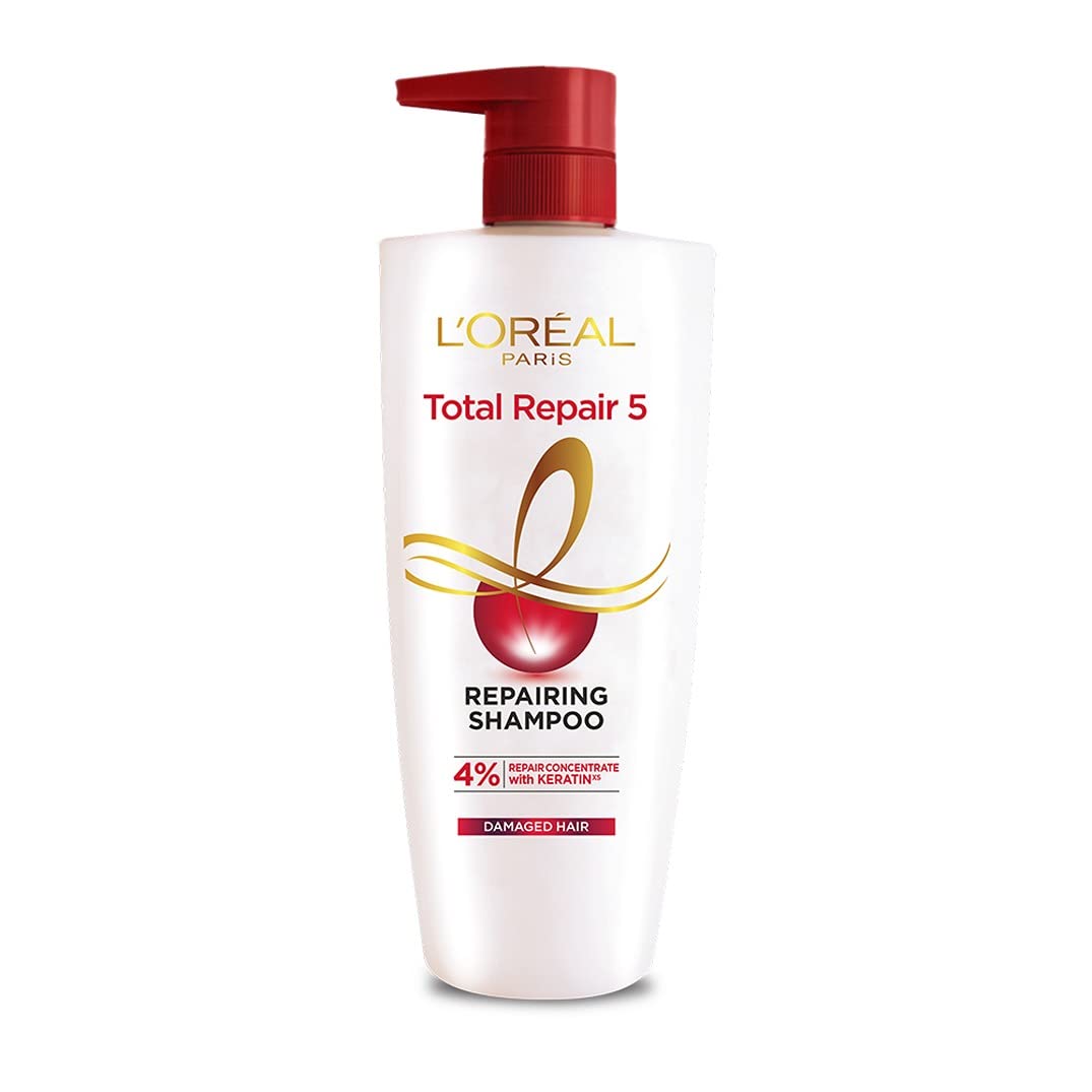 L'Oreal Paris Total Repair 5 Shampoo bottle shows a clear formula for gentle cleansing.