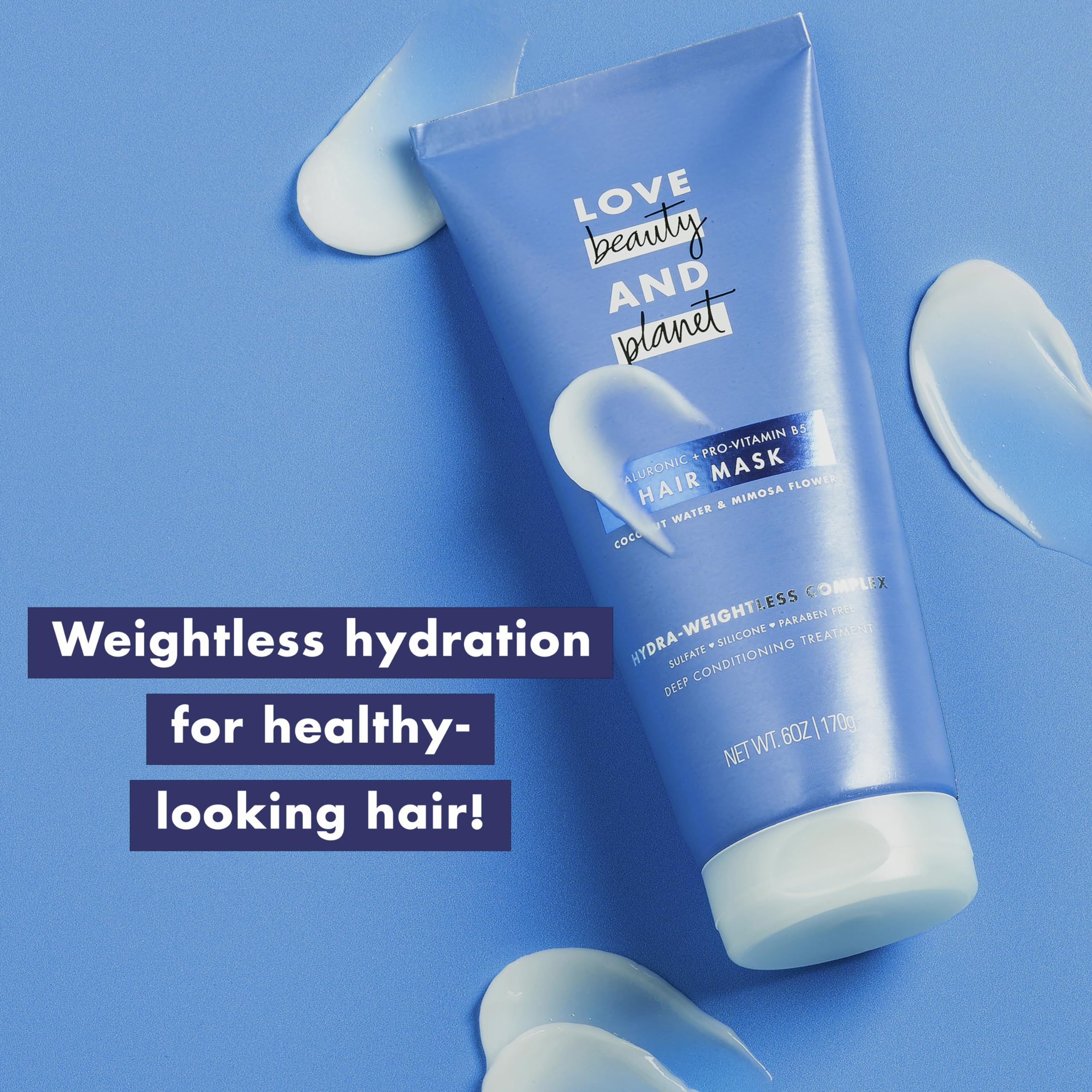 Love Beauty and Planet hair mask tube close-up with creamy texture for detangling.