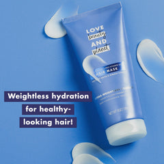 Love Beauty and Planet hair mask tube close-up with creamy texture for detangling.