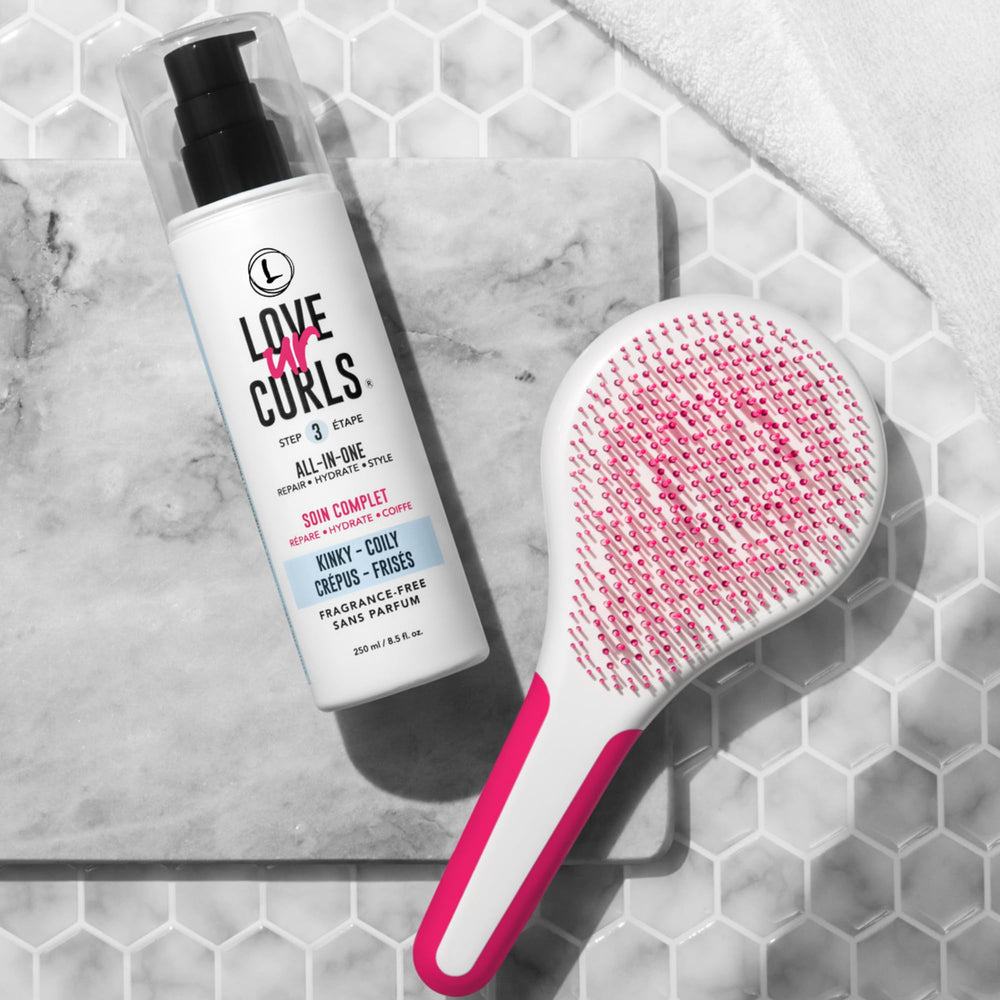 Love Ur Curls fragrance-free curl cream being applied for moisturized, defined hair.