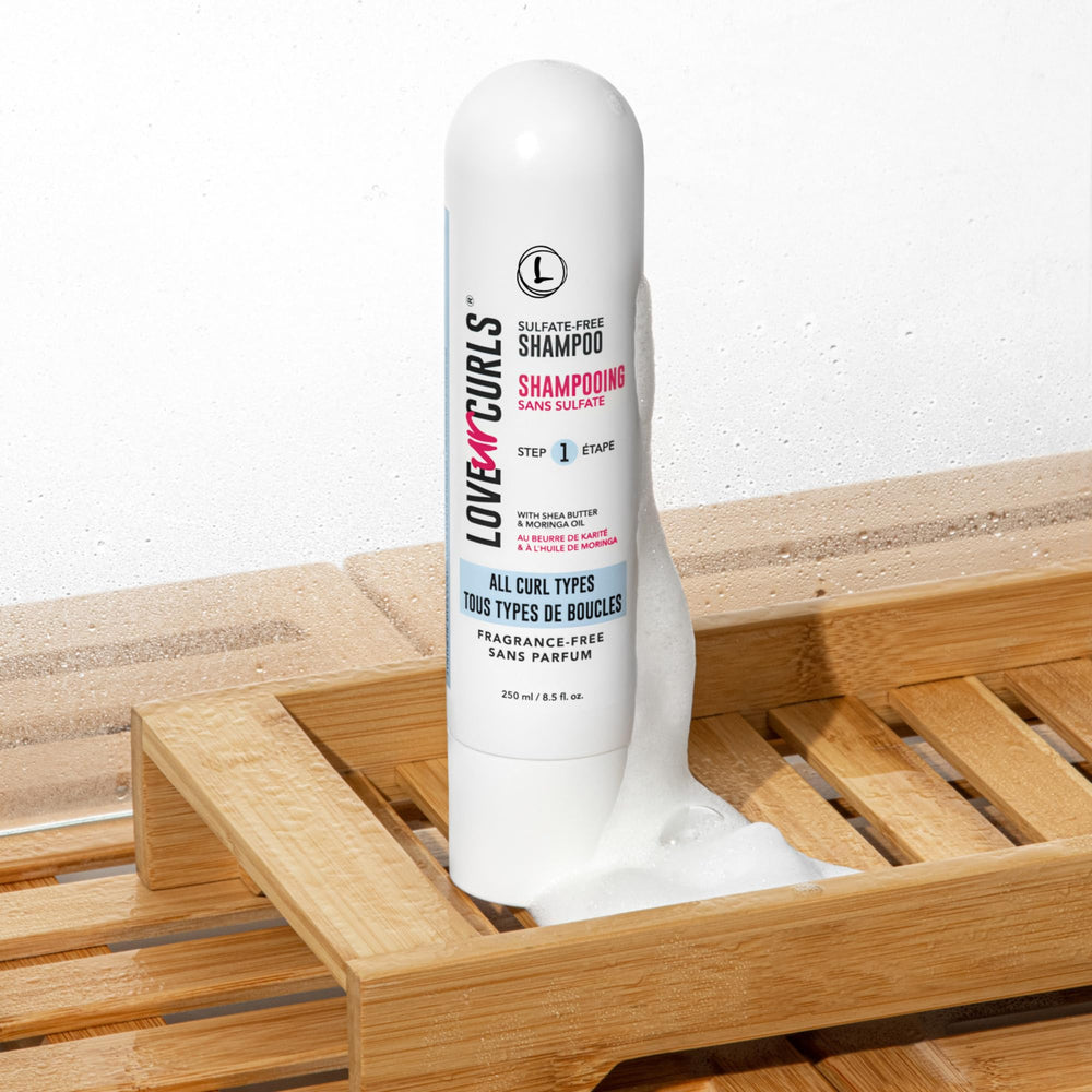 Love Ur Curls fragrance-free shampoo lather showcasing light cleansing without stripping oils.