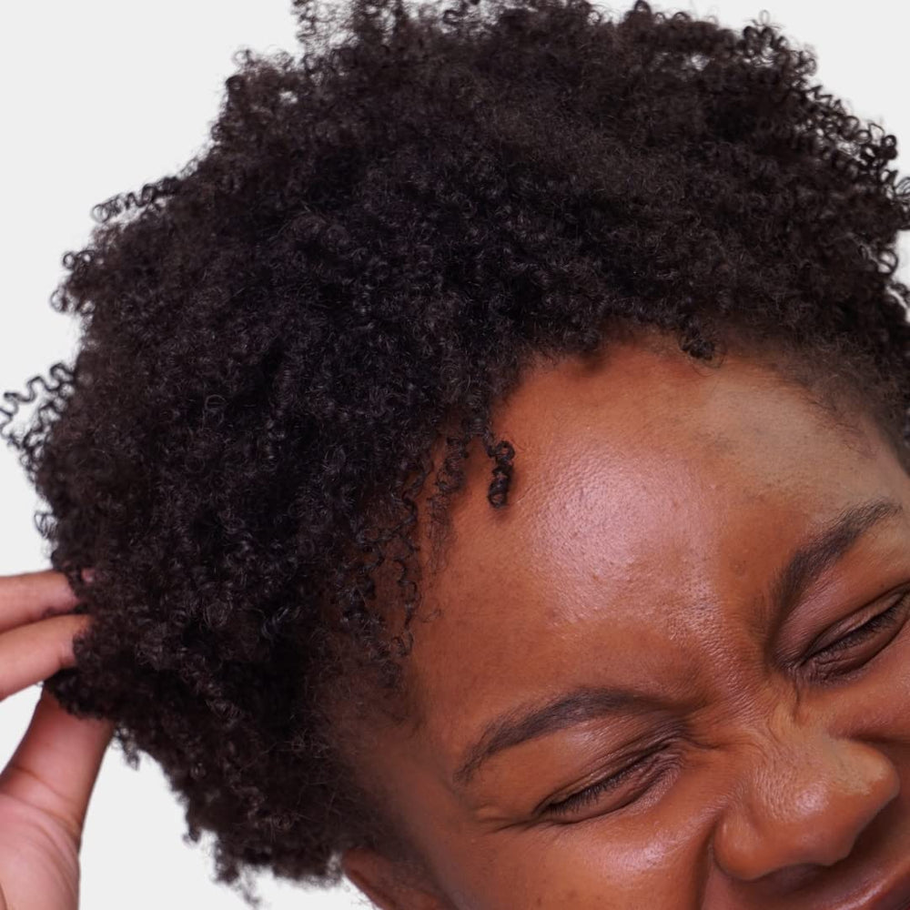Vegan, cruelty-free label on Love Ur Curls packaging for conscious hair care