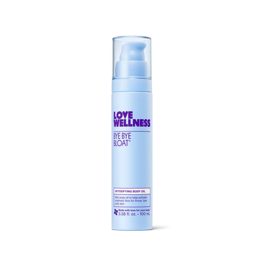 Love Wellness Bye Bye Bloat Oil bottle ready for use, hydrating skin.