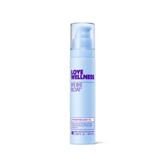 Love Wellness Bye Bye Bloat Oil bottle ready for use, hydrating skin.