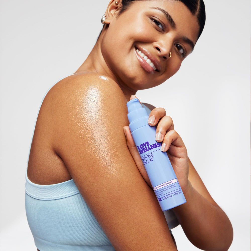 Love Wellness Bye Bye Bloat Oil skin looks hydrated after massage.