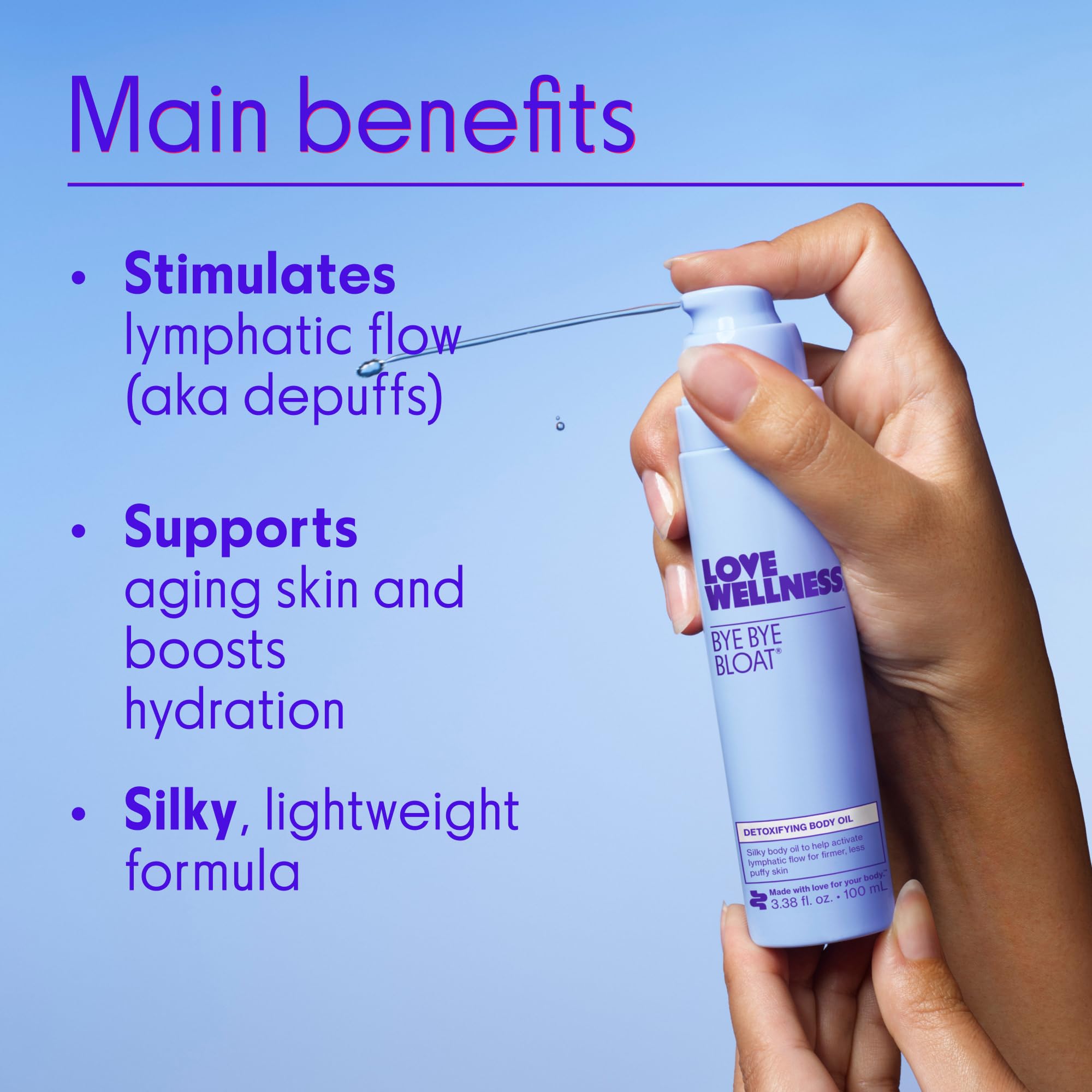 Love Wellness Bye Bye Bloat Oil application on skin during a massage.
