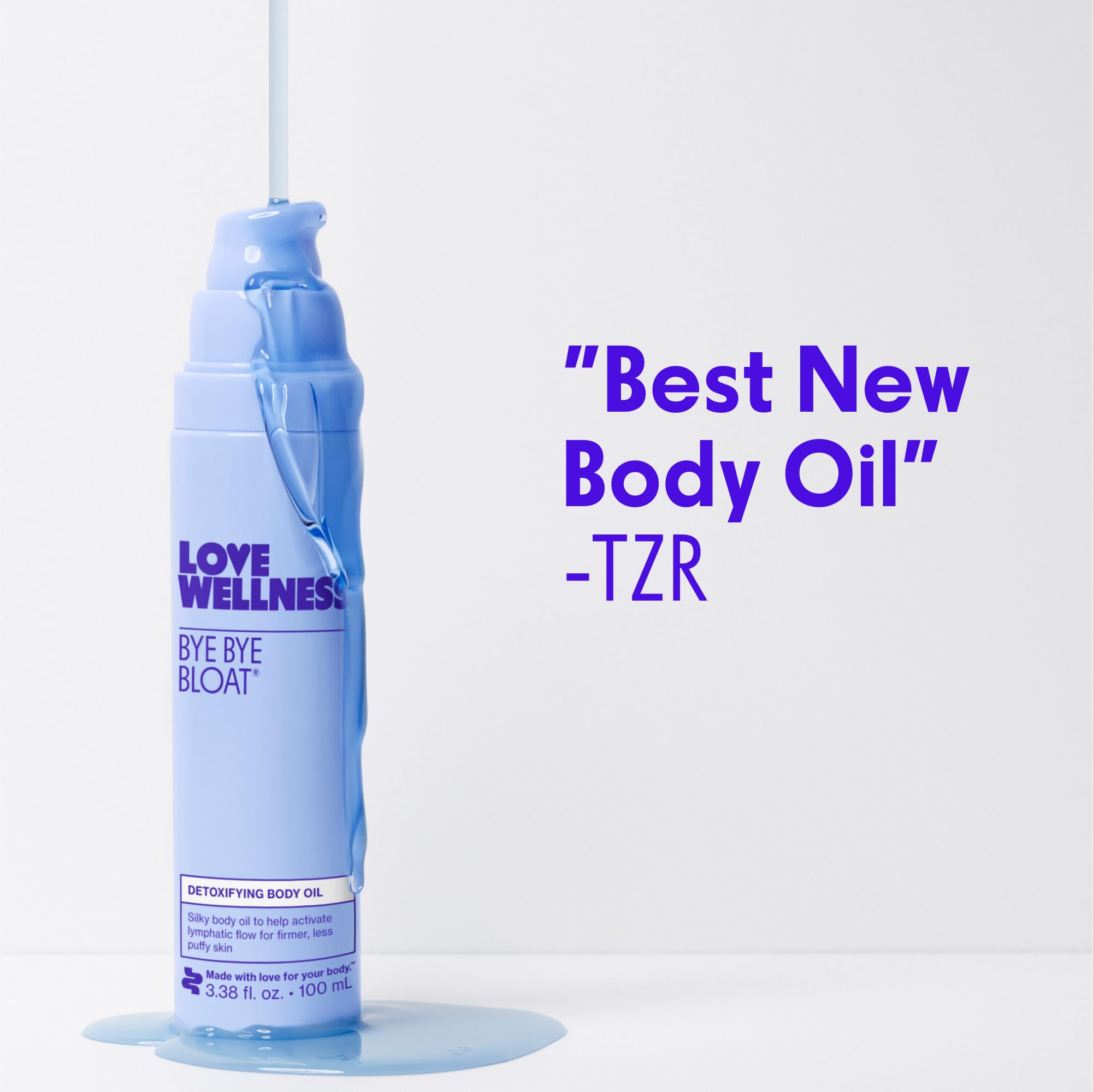 Love Wellness Bye Bye Bloat Oil rosemary sprig highlighting scent.