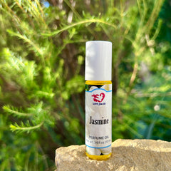 Love from Santa Barbara Jasmine roll-on application for quick touch-ups.