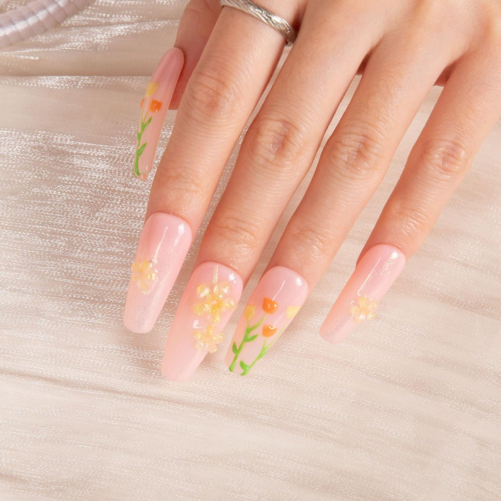 Reusable coffin classic nails offer long wear with an elegant crystal accent.