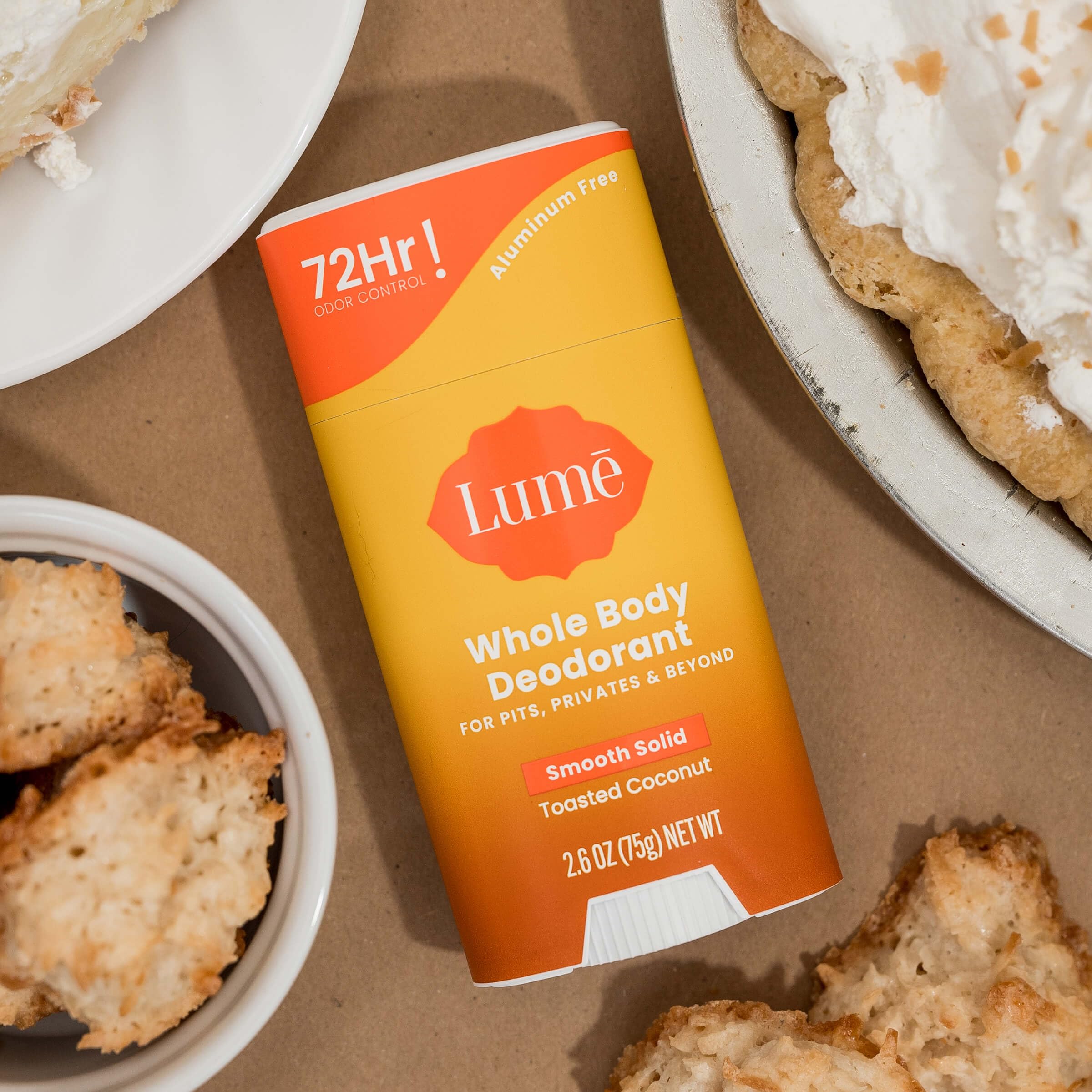 Lume products displayed on clean bathroom shelf.