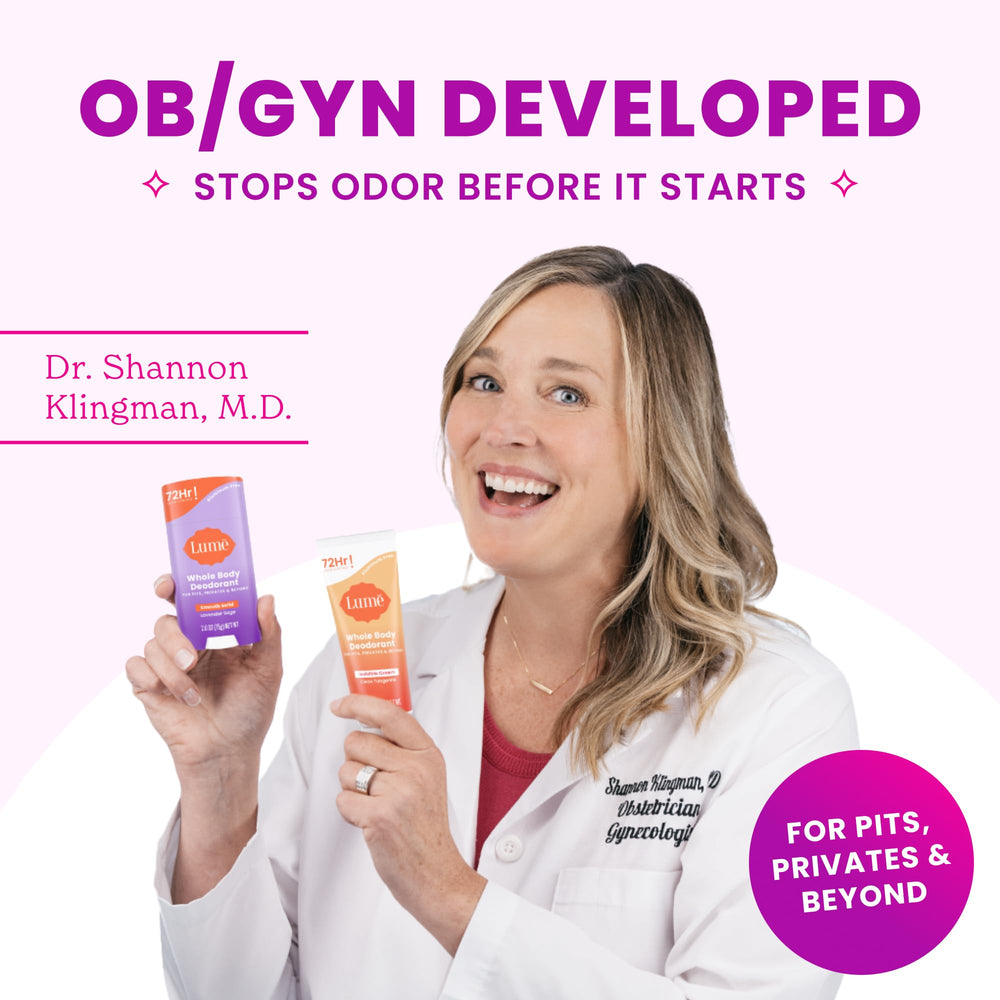 Hands applying Lume deodorant on skin for odor control