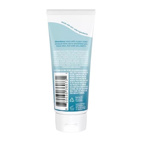 LUME deodorant being applied, showing smooth texture for underarms and beyond.