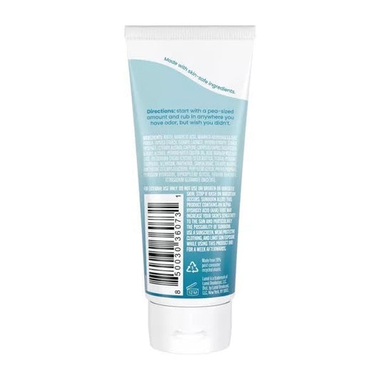 LUME deodorant being applied, showing smooth texture for underarms and beyond.