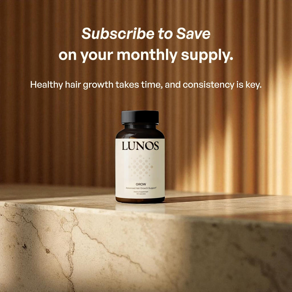 Lunos Grow Hair bottle in hand ready for your daily routine.