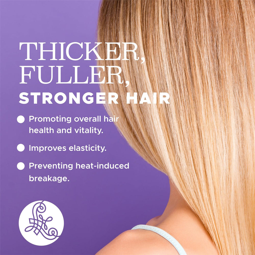 Luseta Biotin & Collagen spray being applied to damp hair before heat styling.